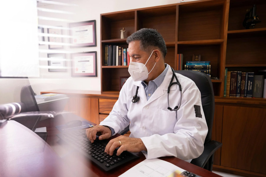 A physician using Patient360 for MIPS Improvement Activities