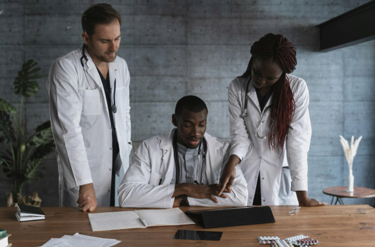 Three doctors studying