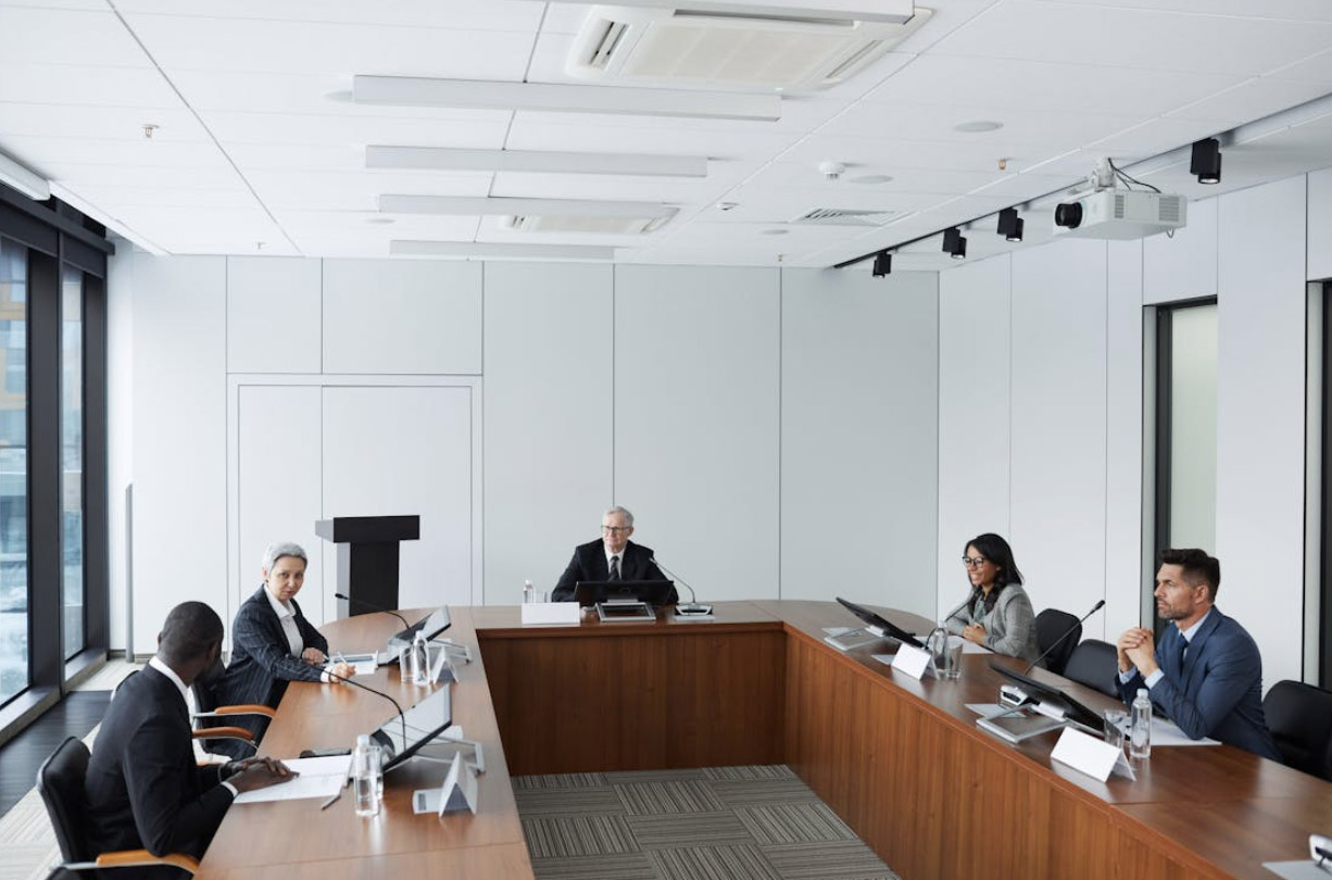 Business People gathered on a Conference Room