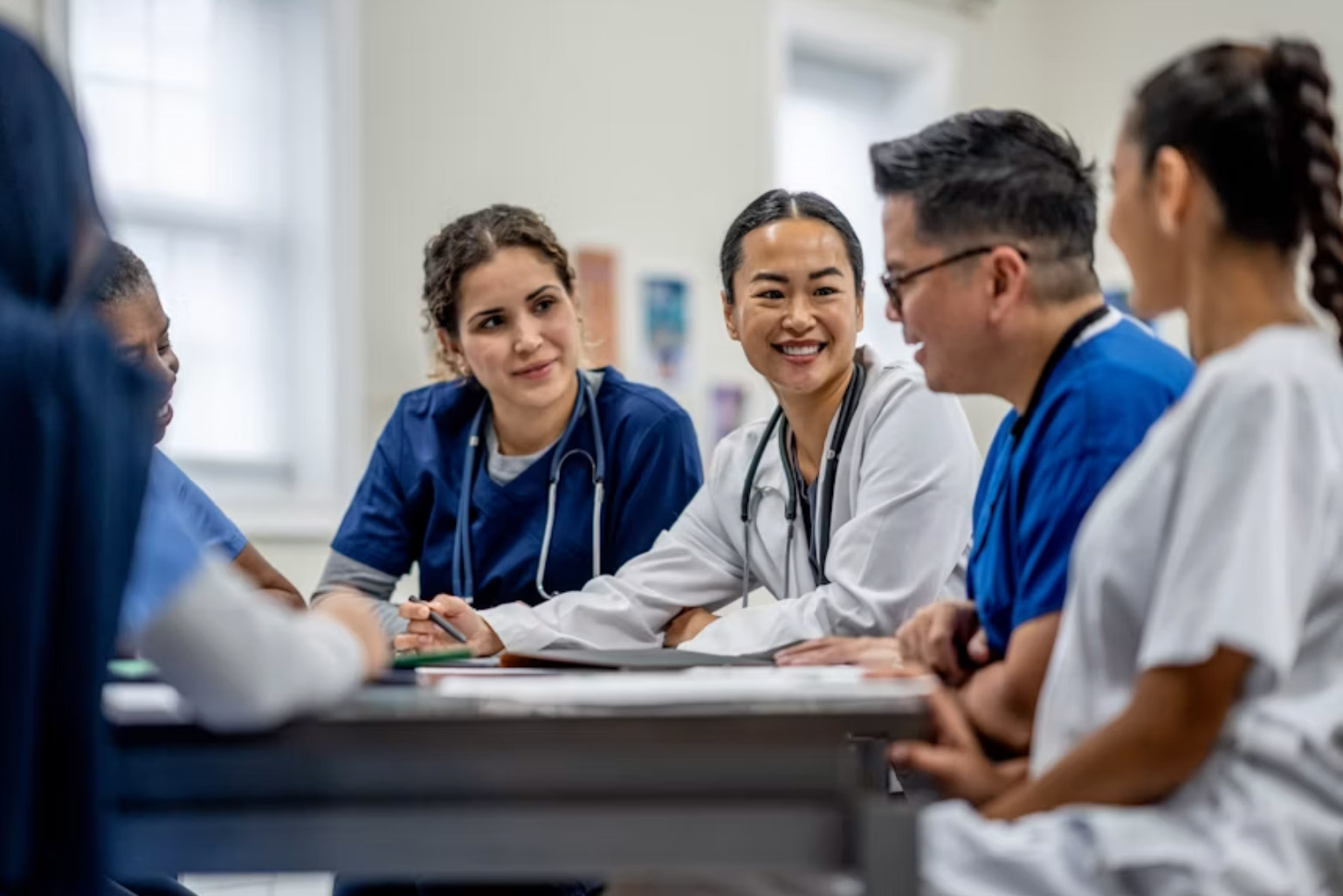  A specialty care team reviewing MVP-specific quality measures together.