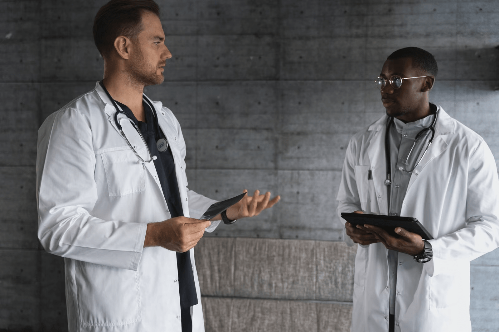 A medical team of specialists including orthopedic and cardiology professionals discussing patient care coordination